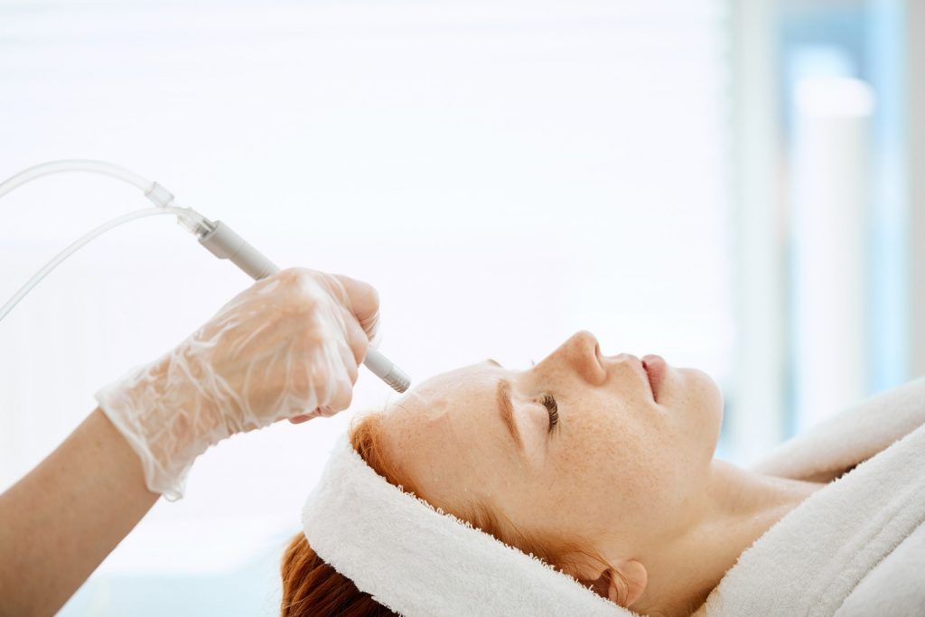 Side,View,Of,Female,Patient,Undergoing,Facial,Anti-aging,Procedure,In